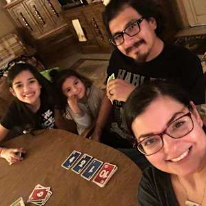 My family and I playing cards in Old bunkhouse cabin