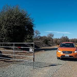 View from driving out of the property. Once you go through the gate, it's a short drive down to Frank's house, along with tent sites on the left when coming in.