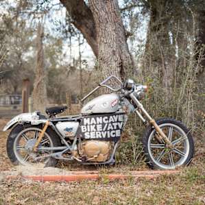 You'll know you're in the right place when you see the motorcycle inside the gate.