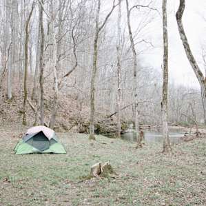 This camping spot is beyond beautiful. The sun sets on the back side over the mountain. The creek is right beside this site located at the corner of the property.