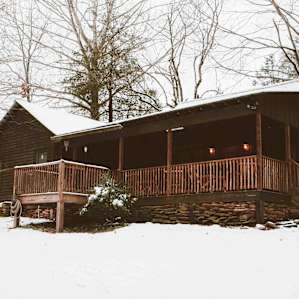 View of the cabin from the creek. That porch was a dang dream.