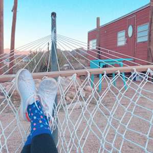 Lounging around on the hammock while enjoying the beautiful sunset and view this location has to offer. The trailer in the background is being renovated and I assume will be open for guests in the near future. It looked very nice inside with a couple beds too!