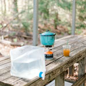 Drinking water and cookware are provided. Coffee is not, but suggested ;)