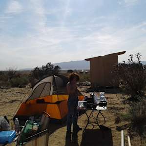 Our tent and the table setups they have for campers to use