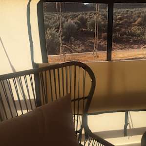 Indoor seating in Josey Wales: you don't need to go outside to enjoy the sunset.