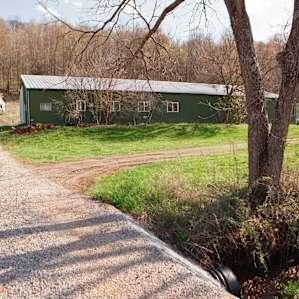 The green barn. The Echinacea room is the fifth window from the left.
