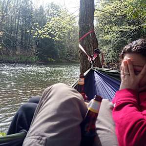 My wife and I enjoying peace and quiet along the river. . .