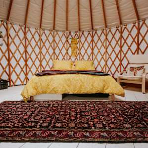 The yurt feels incredibly spacious, warm and inviting.