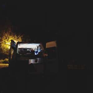 Our glowing rig outside the communal shed area that helped us escape the rain we encountered!