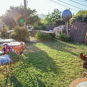 Right when you walk in, there's a spot to your left up the driveway to stay (one of two places to camp!).