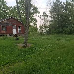This is the house that you will come to when you drive down a long gravel/dirt drive (barley viable from main)