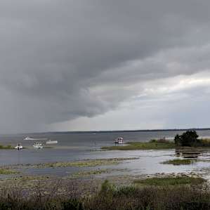 Storm Rolling across Lake Weir. Check out the boaters watching, too!