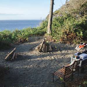 Sandy area for hanging out by the fire.