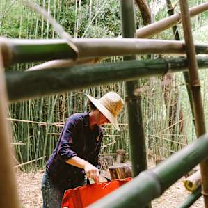 Finding a spot to chill inside the bamboo room!