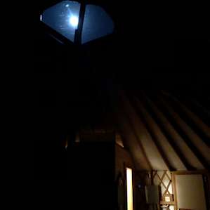 The moonlight shining into the yurt.