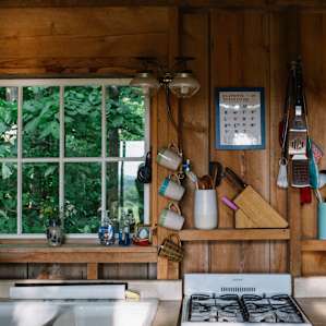 Perfect little kitchen set up with a gas stove and water pump for washing dishes!