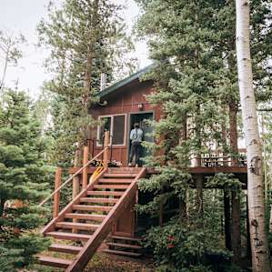 The cutest treehouse you ever did see! The entrance faces the forest for complete privacy