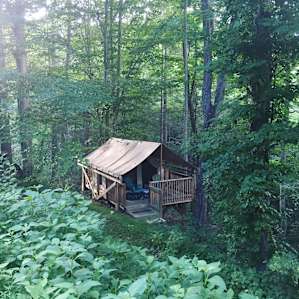 Tucked right along a slope in the middle of the woods.