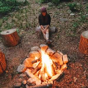 people campfire camper