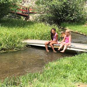 My girls enjoyed cooling off in the tiny creek behind the lodge.