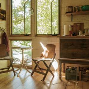 the sun floods into the cabin in the morning