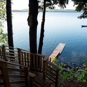 Watching a fisherman paddle past from the upper deck.