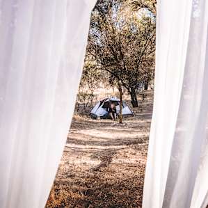 The linens provided a wonderful aesthetic and created a private little nook by the creekside