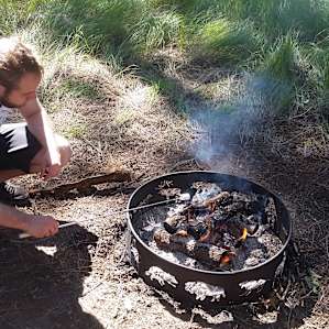 Roasting marshmallows.