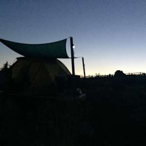 Tent silhouette at twilight.