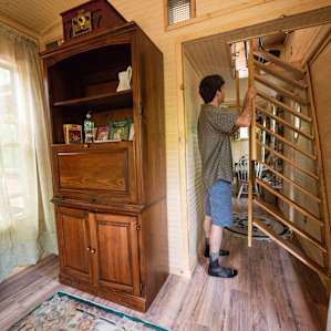 There are fold down stairs to get to the living room
