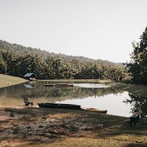 The lake, with canoes you can use! Such a fun place!!