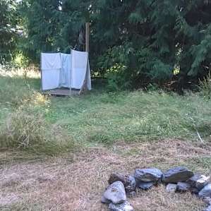 The outdoor shower in close proximity. The outhouse toilet is a couple minutes walk away and is shared with others.