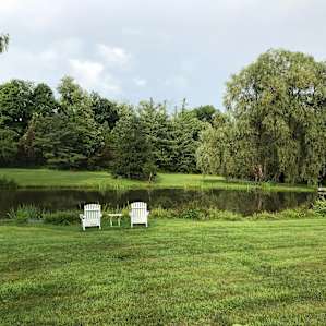 pond and chairs zoom out