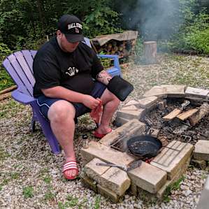 Firewood, fire grate, and a charcoa