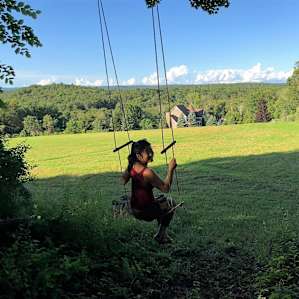 Great tree swing overlooking the property