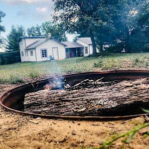 Fire pit and lodgehouse.