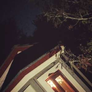 Tiny house at night.