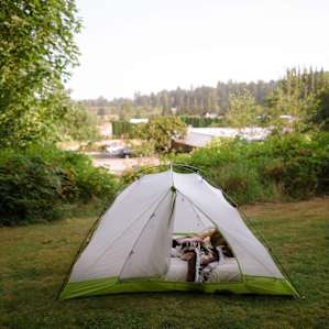 We put our tent on the hill, and parked the car just below in their driveway