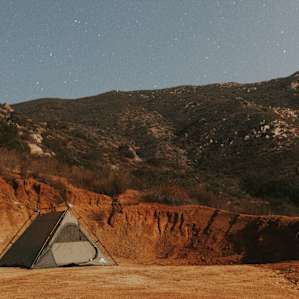 Tent under the light of the moon and stars