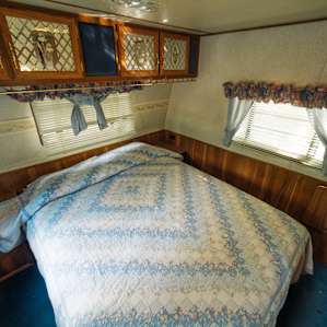 Queen size bed ready for a comfortable night's sleep