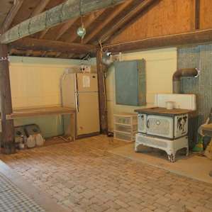 Farthest back area inside pavilion. Having fridge and electricity was super nice.