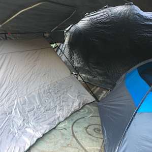 Our 2 small tents fit under the canopy