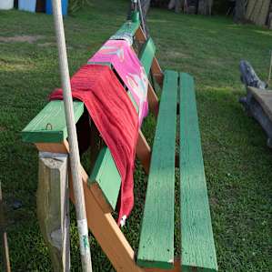 Nice benches by the fire pit, we're drying our towels from swimming in the nearby local spot