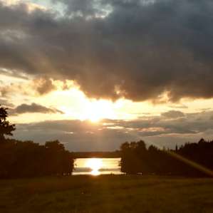 Sunset on the lake from the hill by the cabin