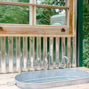 Perfect outdoor space for getting ready in the morning or meal clean-ups!