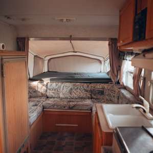 The other bed, sitting area, sink/kitchen etc.
