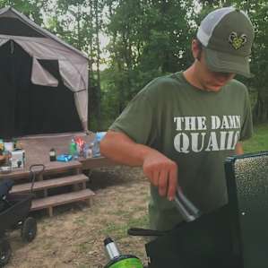 Table right out front of tent that will hold what you need and perfect for your cooking needs