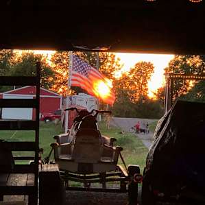 The perfect sunset from under the barn, where all the firewood is stored and easily accessible.