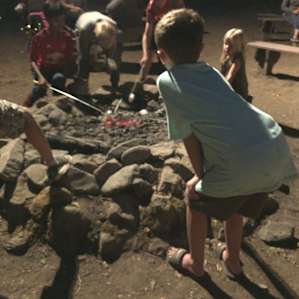 Roasting marshmallows with other campers