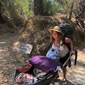 The camp is down a short road from parking, and there are great wheelbarrows to help you carry. Good workout!!